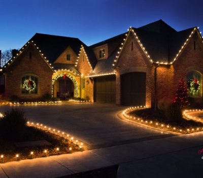 House With Christmas Lights At Night